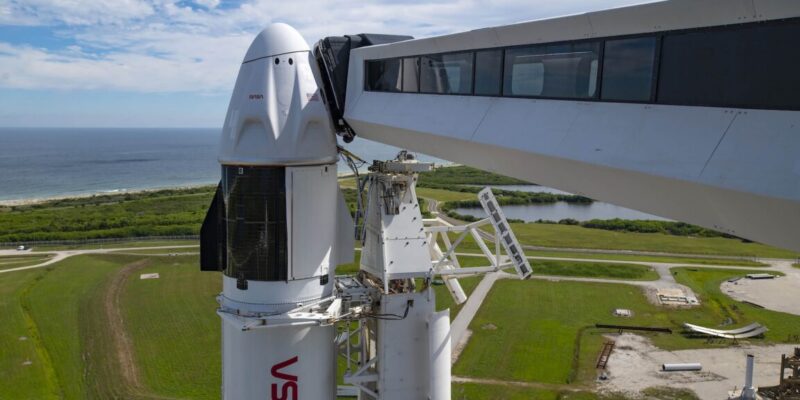 spacex takes down dragon crew arm giving