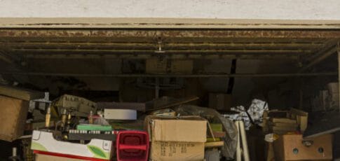 Americans’ junk-filled garages are hurting EV adoption, study says