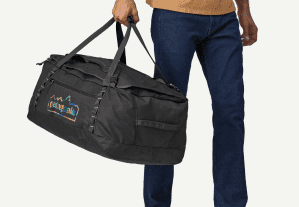 A person holding the Patagonia Black Hole Duffel