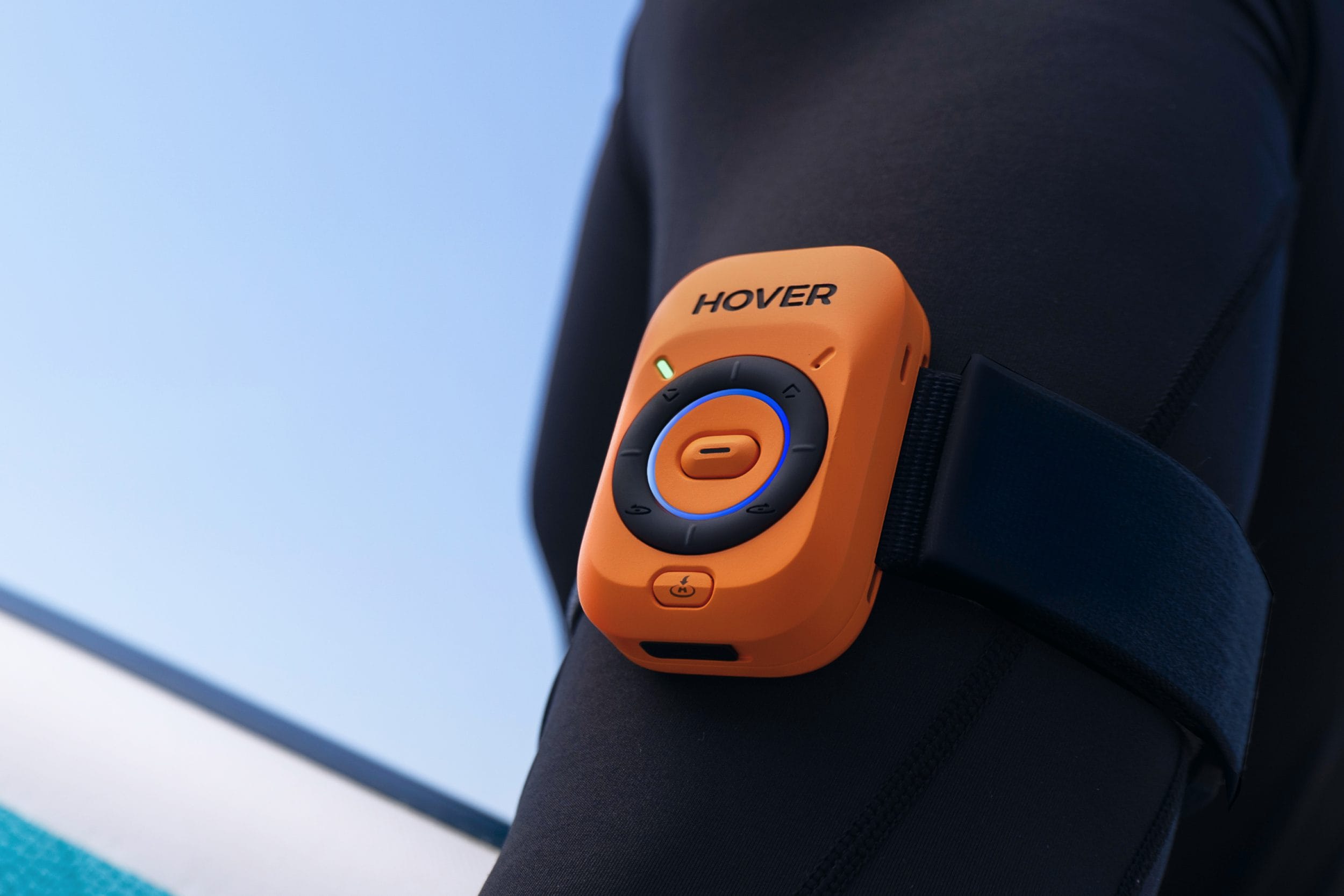 The HoverAir Lighthouse accessory worn on someone’s arm.