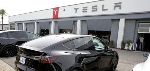 tesla is redesigning its door handles following