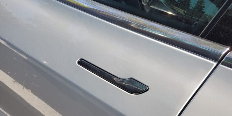Tesla Model Y door handles now under federal safety scrutiny 18 tesla model y door handles now under