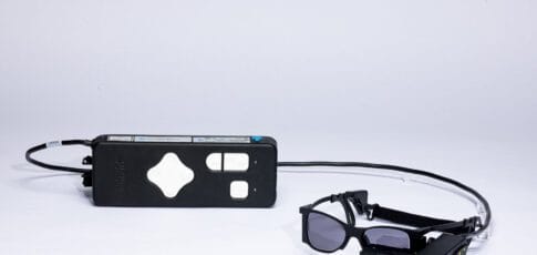 an eye implant and smart glasses restore