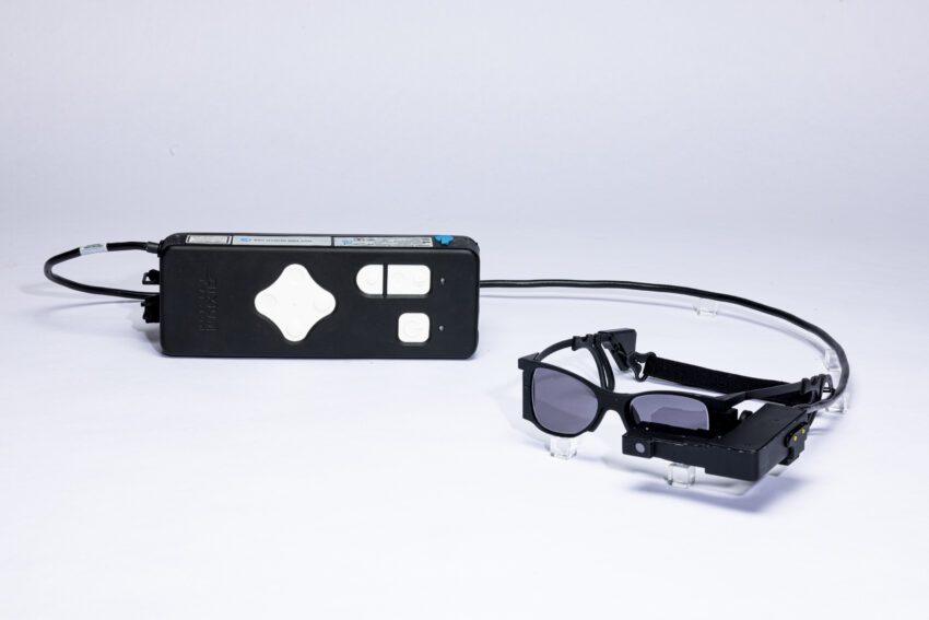 an eye implant and smart glasses restore